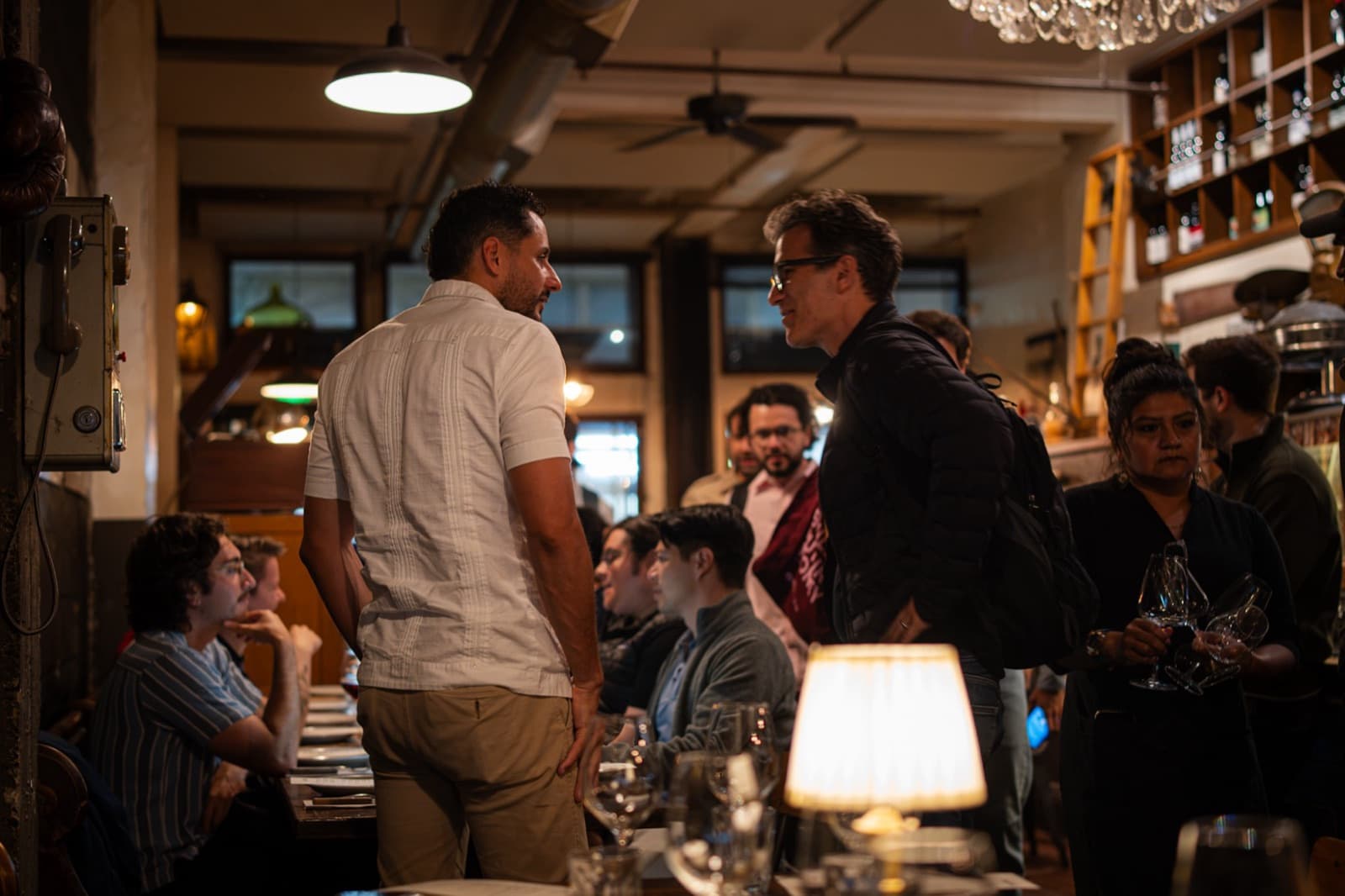 Founders and investors talking at a Pygma dinner