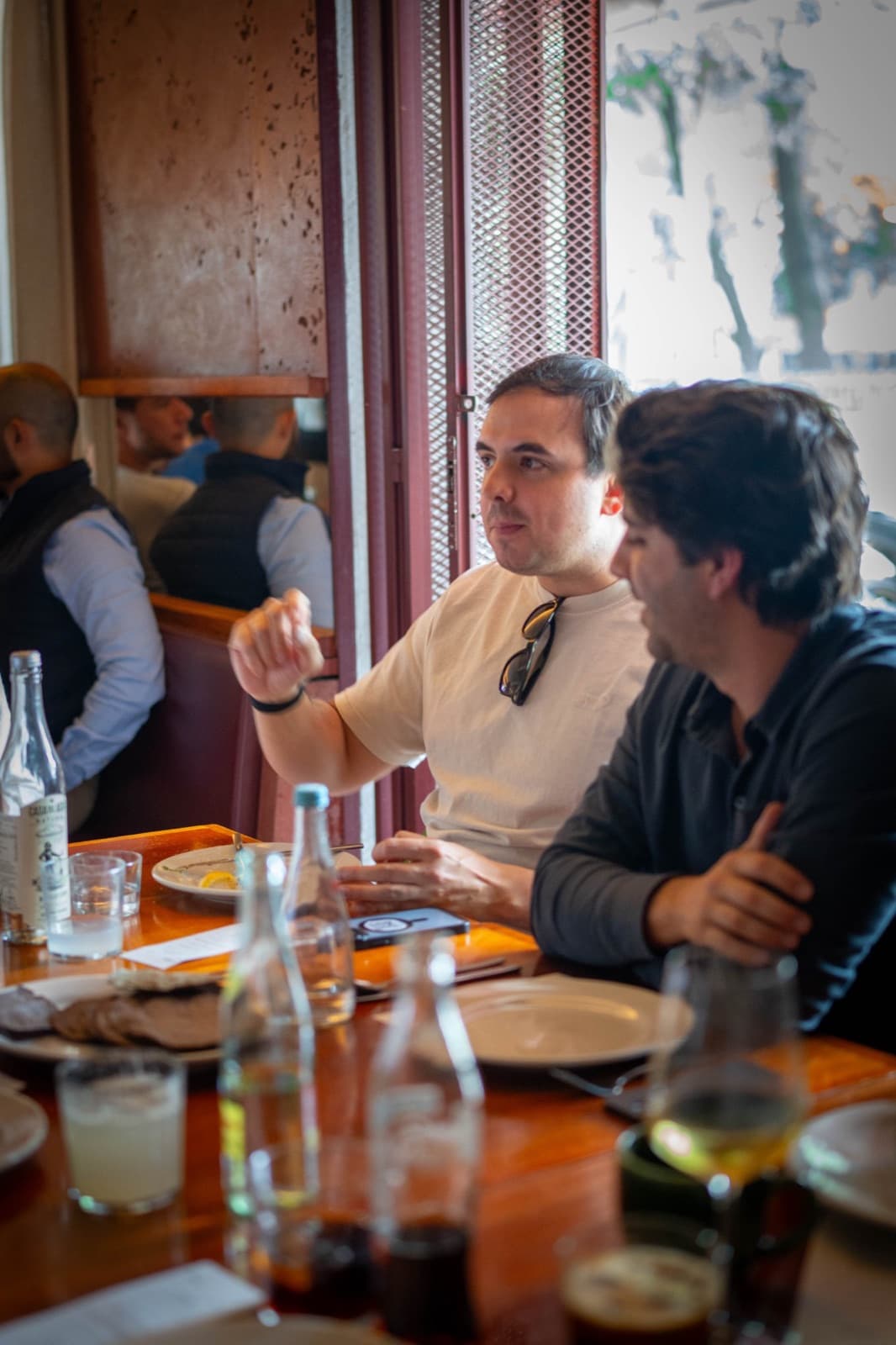 Founders in conversation over lunch